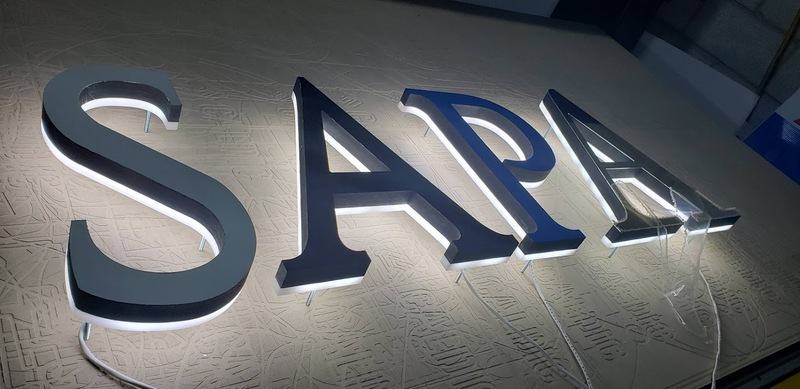 Backlit channel letters sign fabricated in Cambridge by DLST
