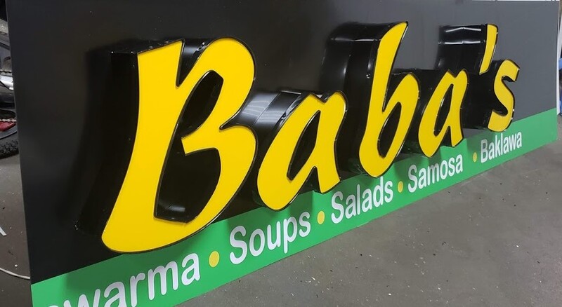 Commercial sign fabrication  -  dimensional letters being built for a local business