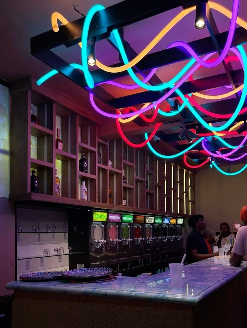 LED neon ceiling decoration installation in a bar and restaurant